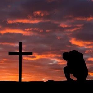 kneeling-at-cross.jpg
